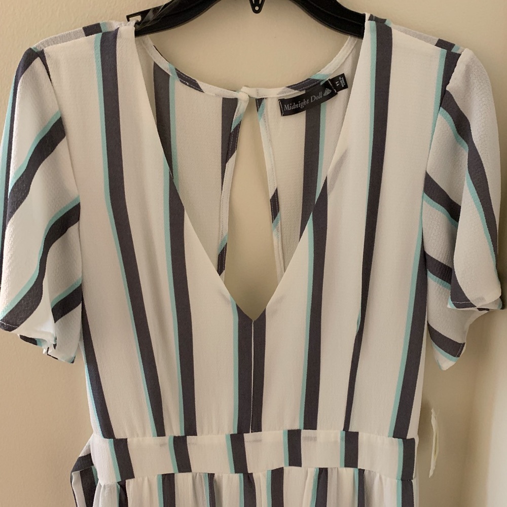 Women’s Romper with Skirt/Cape.